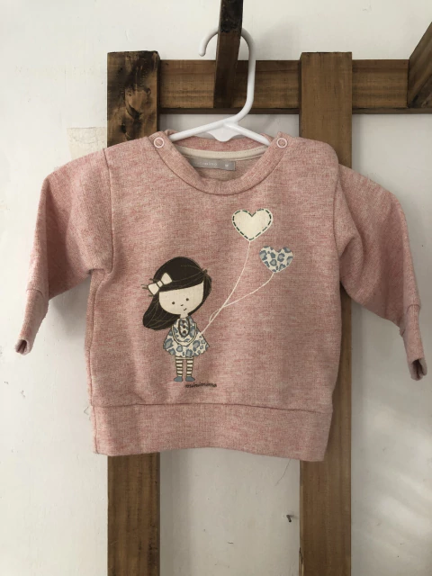 Buzo rosa con dibujo y brillos. MIMO. 6 meses.