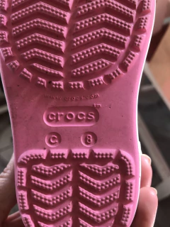 Botas de lluvia rosas. CROCS. C8. en internet