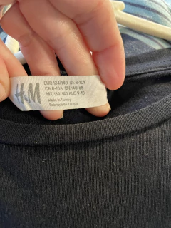 8A | Remera negra MC con lentejuelas que se dan vuelta. HYM. 8 años. - comprar online