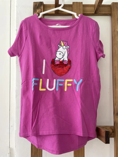 8A | Remera unicornio con lentejuelas. Universal Studios. 8 años.