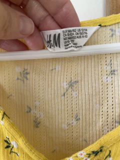 12A | Remera amarilla con flores y botones. HYM. 12 años. Parece más 10 años. - comprar online