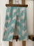 Outlet- Pantalón pijama turquesa con llamas. CARTERS. 2 años.