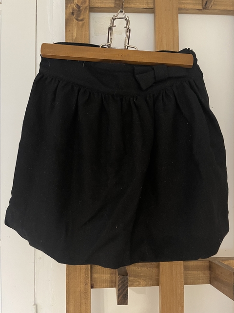 10A | Pollera negra globo con moño. Adolfo Domínguez. 10 años.