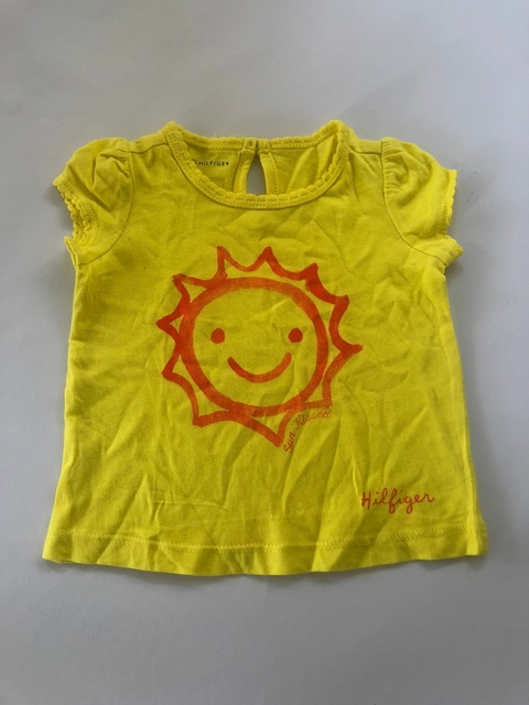3/6M | NUEVA - remera amarilla con un sol. TOMMY. 3/6 meses.