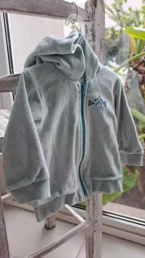 9/12M | OUTLET - Buzo celeste de plush. ADVANCED. Talle L. (aprox. 9/12 meses)