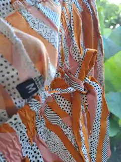 Pantalón tipo babucha c elastico y cinturon, a rayas naranja y rosa - Talle S de adulto. - Lo Canto • Moda Circular