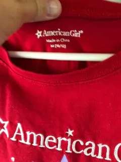10/12A | Remera MC roja "American Girl". Talle 10/12 años. en internet