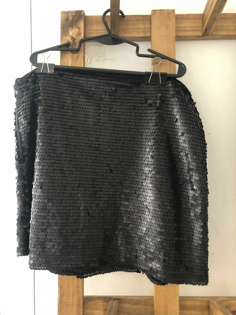 Pollera negra con lentejuelas. ZARA. Talle xs de adulto pero parece Small- Ver medidas de la foto. 38 cm de cintura.