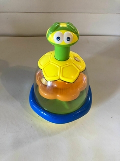 Juguete- Tortuga que se presiona y gira lo de adentro. - comprar online
