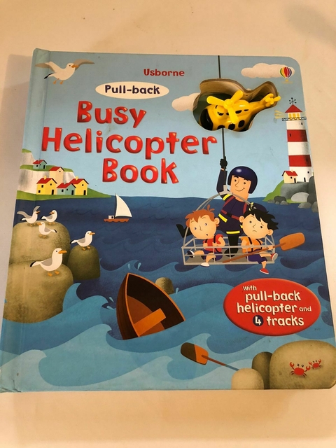 Libro- Busy helicopter book. El libro tiene páginas gruesas y un heliptero para jugar y hacer los recorridos.