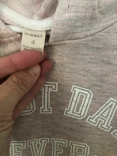 Buzo finito con capucha rosa jaspeado. CHEEKY. Talle 4 años. - comprar online