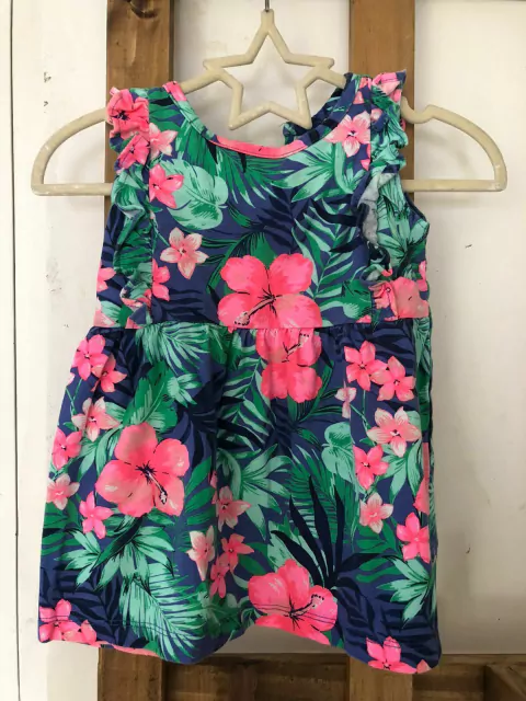 Vestido de flores azul con flores rosas con bombachudo azul. CARTERS. 12 meses.