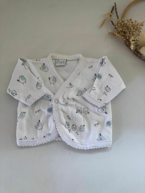 Batita blanca con pajaritos celeste. Recién Nacido-