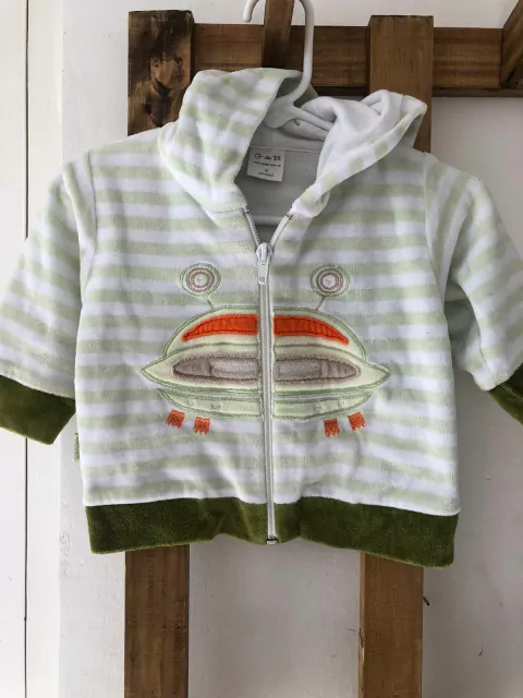 6M | Buzo a rayas verde y blanco con ovni. GdeB. 6 meses.