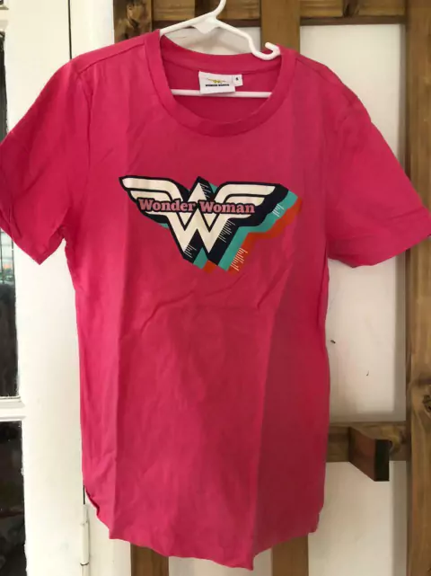 Remera rosa Wonder Woman. 10 años.