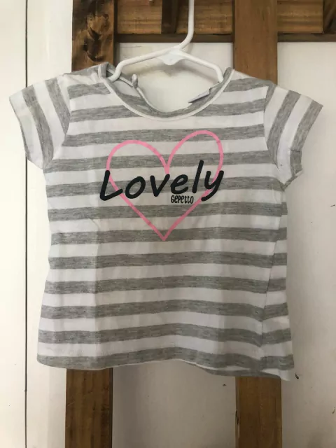 Remera a rayas gris y blanco. GEPETTO. 12 MESES.