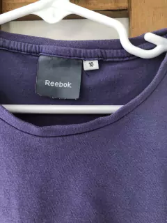 6A | Outlet- Remera MC lila. Reebook. Dice talle 10 pero es más 6 años. - comprar online