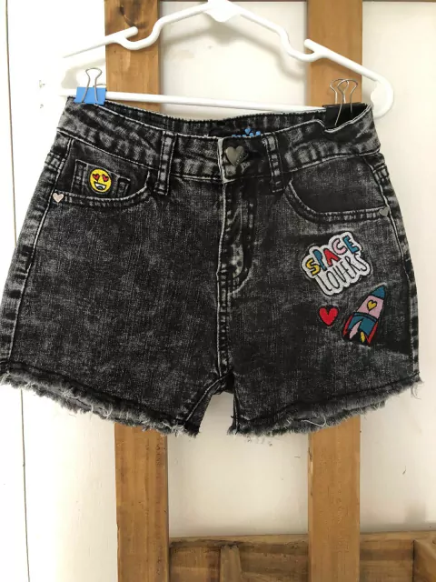 7/8A | Short negro jaspeado con apliques. GRISINO. 7/8 años.