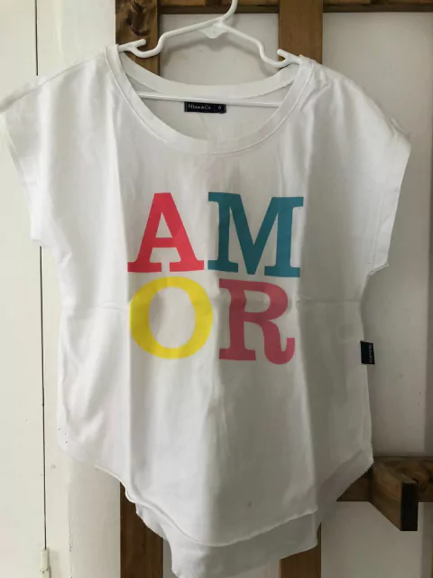 Outlet- Remera blanca Amor. MIMO. Talle 8 años. Manchita.