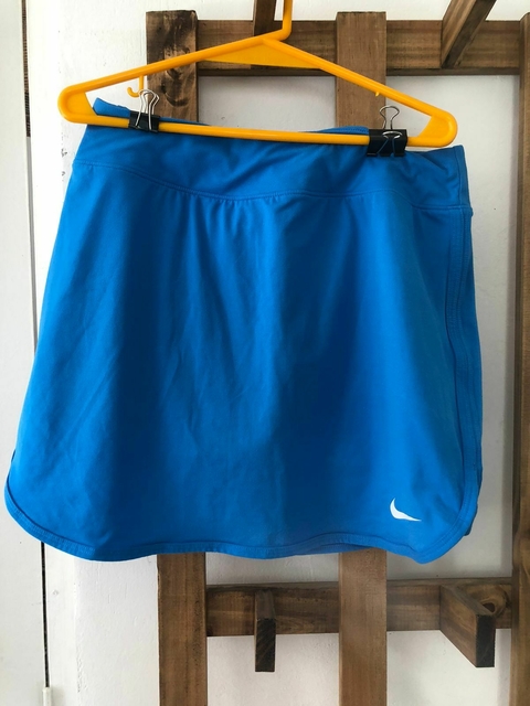 Pollera de deporte azul. NIKE. Talle S de adulto.