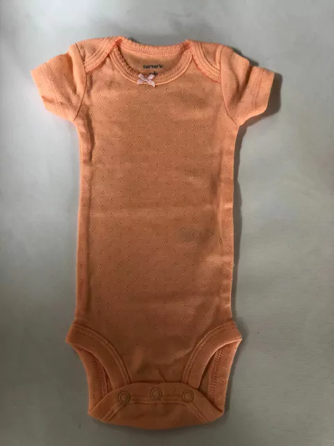 RN | Body MC salmón. CARTERS. Recién nacido. Impecable.