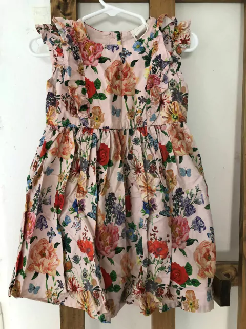 Vestido rosa con flores. HYM. 12/18 meses.