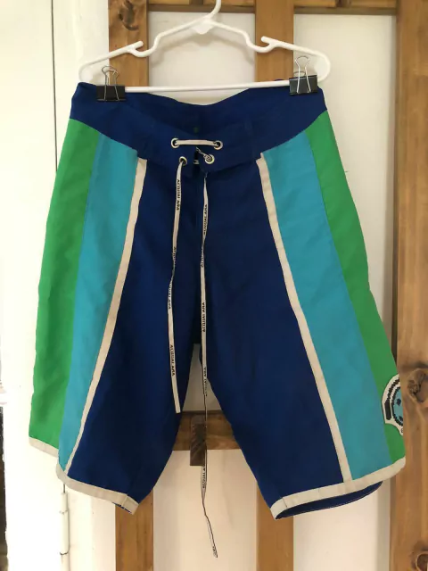 10A | Traje de baño azul, verde y celeste con cordón en la cintura. GRISINO. 10 años.