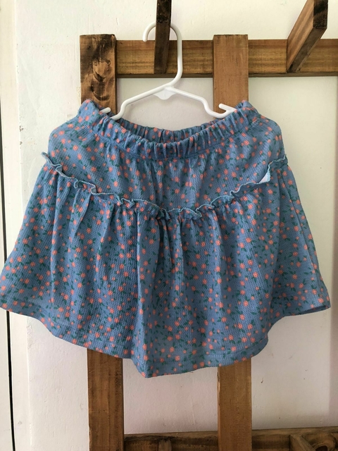 Pollera con short abajo, celeste con flores. ZARA. 7 años.