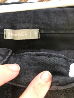 Pollera negra elastizada con botones. MIMO. 8 años. 30 cm de cintura. - comprar online