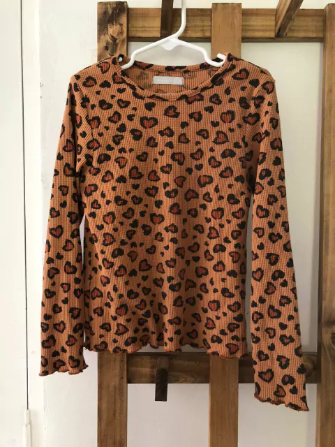 Remera animal print ML. MIMO. Talle 8 años.