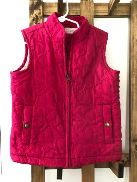 Chaleco fucsia con corderito adentro. GAP. 6/7 años.