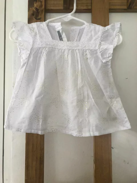 3M | Blusa blanca con estrellitas doradas. Mini MIMO. Talle S. 3 meses.