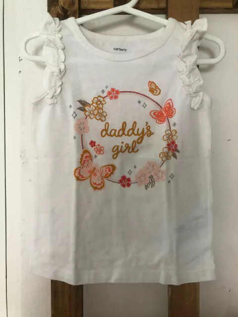 Remera blanca con manguitas e inscripción "Dadys girl". CARTERS. 3 años.