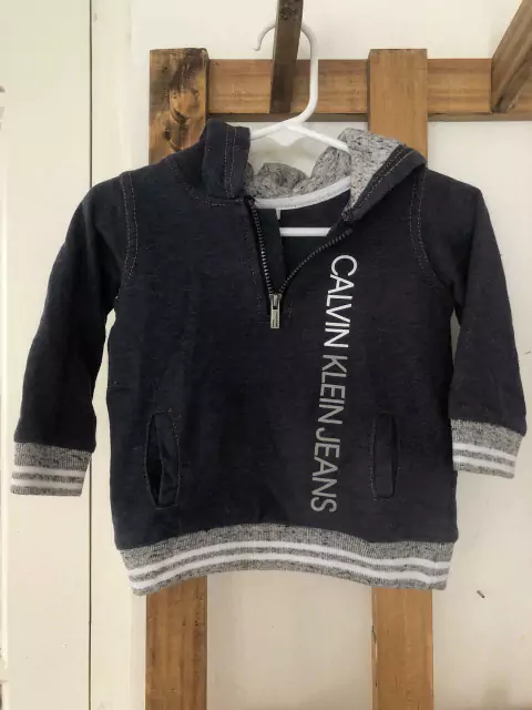 6/9M | Buzo azul con capucha y cierre. CALVIN KLEIN. 6/9 meses.
