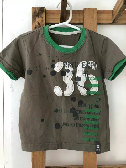 3A | Remera verde MC "36". MIMO. Talle 3 años.