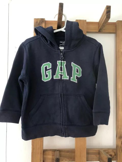 Buzo azul con capucha y cierre. GAP. 3 años.