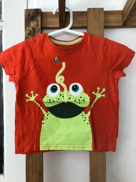 9/12M | Remera naranja MC con sapo. PRIMARK. 9/12 meses.