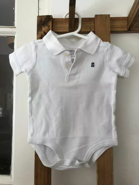 Body chomba blanca. OSHKOSH. 9 meses.
