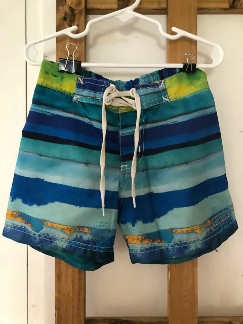 Traje de baño en tonos azules con cordón. MIMO. Talle 6 años.