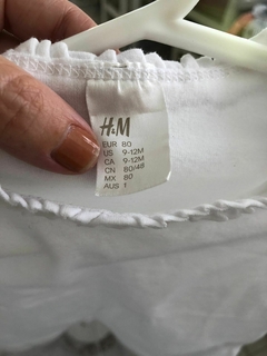 Remera blanca MC. HYM. 9 meses. - comprar online