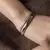 Bracelete Dual Fino Fio de Zircônia com Banho de Ródio Branco na internet