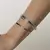 Bracelete Dual Fios Cravejados Banho de Ródio - comprar online