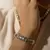 Pulseira Nefertiti Cristal Translúcido Banho de Ródio na internet