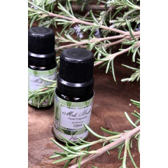 Frascos de essência de alecrim Mels Brushes de 10ml, com fundo de ramos de alecrim.