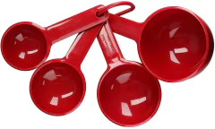 Quatro xícaras medidoras vermelhas da KitchenAid dispostas em uma única imagem.