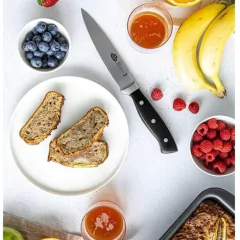 faca para carnes 15 centímetros e acompanhado de frutas de fatias de pão