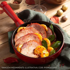 frigideira de cerâmica pomodoro com o interior vermelho servindo uma refeição