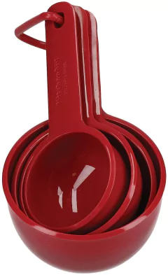 Conjunto de 4 xícaras medidoras vermelhas da KitchenAid, empilhadas uma dentro da outra.