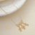 Colar Canga Corações Cravejados Com Três Filhos Folheado A Ouro 18k