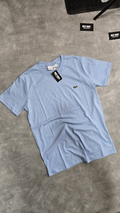 Remera lacoste celeste